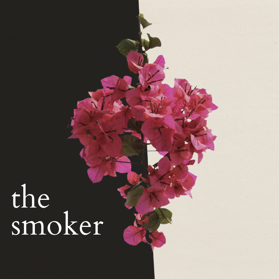 Flowers forming a heart shape with the text "The Smoker"